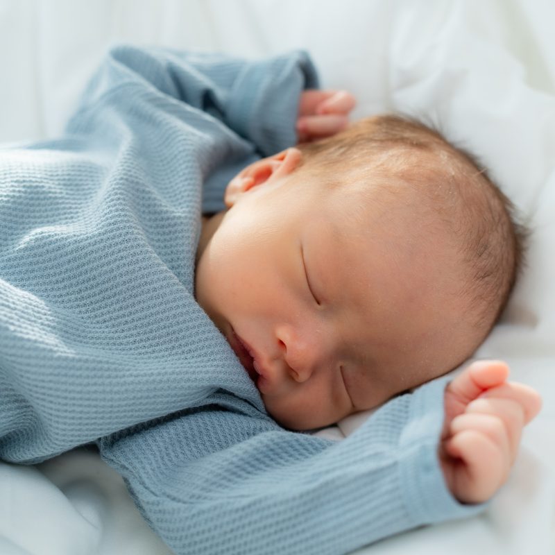 Newborn baby sleep on bed